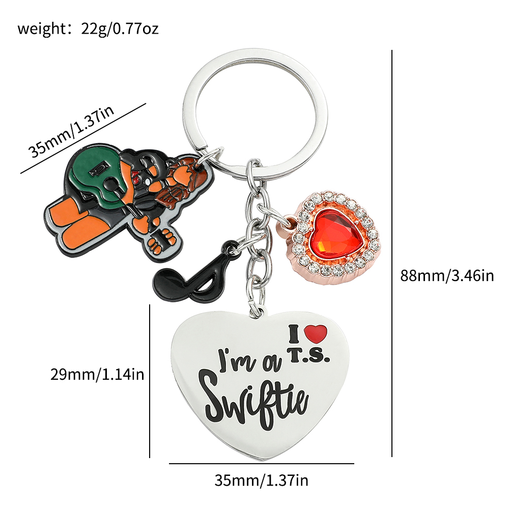 Breloczek Taylor dla fanów, ko – Women Accessories Pack recenzja i cena